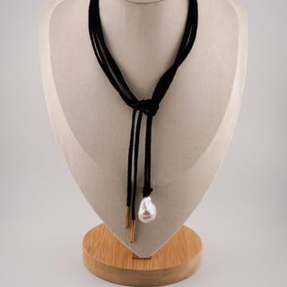 Elegant Black Cord Necklace with Large Baroque Pearl Pendant, showcasing a unique 25x15mm pearl on a 64" suede cord.