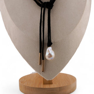 Stylish Black Cord Necklace with Large Baroque Pearl Pendant, featuring a unique 25x15mm pearl on a 64" suede cord.