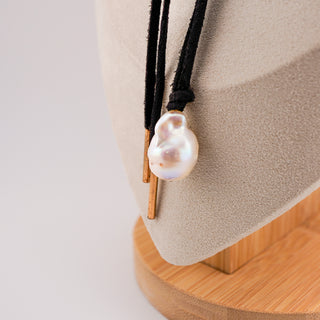 Stylish Black Cord Necklace with Large Baroque Pearl Pendant, featuring a unique 25x15mm pearl on a suede cord.