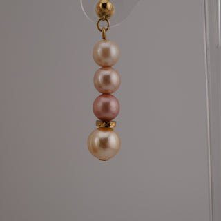 Vintage Napier Pastel Faux Pearl Parure showcases elegant pastel faux pearls, perfect for classic jewelry lovers.