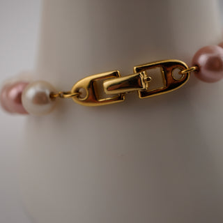 Elegant clasp detail of the Vintage Napier Pastel Faux Pearl Parure, showcasing classic jewelry design and charm.