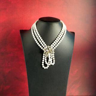 Vintage Triple-Strand White Glass Bead Necklace with Ornate Crescent Focal Point and Prong-Set Rhinestones