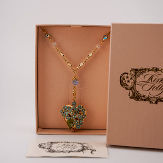 Vintage Kirks Folly Forget Me Knot Gold Plated Heart Locket Pendant Necklace 29 Inch NOS