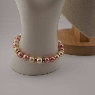 Vintage Napier Pastel Faux Pearl Parure showcases a lovely bracelet with pastel faux pearls and elegant gold accents.