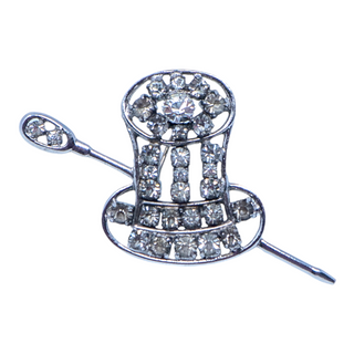 A vintage sterling silver and Austrian crystal brooch in the shape of a cane and top hat motif.