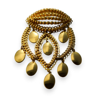 An oversized gold tone dangle brooch with multiple chains and teardrop-shaped pendants.
