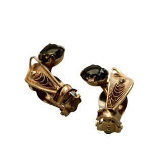 A pair of vintage Charles Reiss 12K gold-filled filigree topaz rhinestone clip-on earrings.