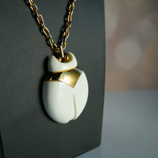 Vintage Crown Trifari Gold Tone Jelly Belly Lucite Beetle Pendant Necklace - View 3 | Reserved Grace