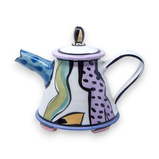 A vintage Parker Kuhns art pottery modernist teapot with a lid, featuring an abstract pattern in vibrant colors including green, pink, and purple, with playful scrolls and polka dots.