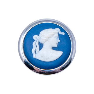 A vintage Wedgwood sterling silver brooch featuring a white profile of a woman on a dark blue background, with the Wedgwood 'W' signature on the back.