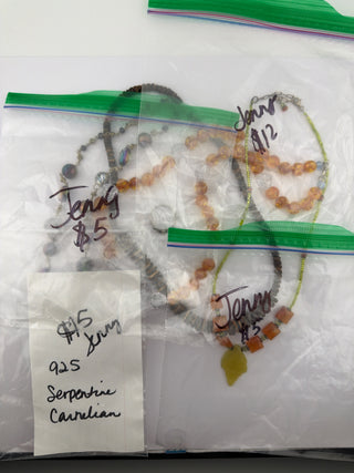 Reserved Grace assorted beaded necklaces and sterling silver ring set with amber, wood, and serpentine accents.