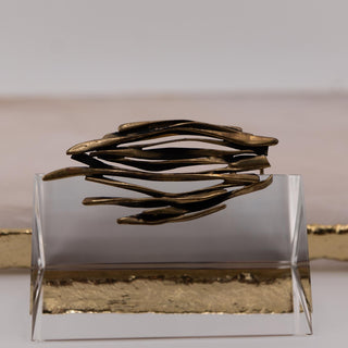 Reserved Grace vintage brutalist brass brooch featuring an organic, twig-like design in a gold-tone finish.