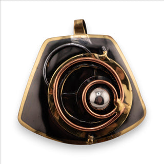 Reserved Grace brutalist pendant featuring layered bronze and copper spirals with a central silver sphere on black metal