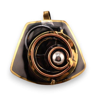 Reserved Grace brutalist pendant featuring layered bronze and copper spirals with a central silver sphere on black metal