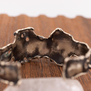 Reserved Grace artisan brutalist silver tone cuff bracelet with textured metal and dichroic glass accents