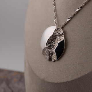 Reserved Grace vintage sterling silver Brutalist pendant necklace with polished and molten textured silver finish.