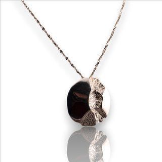 Reserved Grace vintage sterling silver Brutalist pendant necklace with polished and textured molten silver finish.