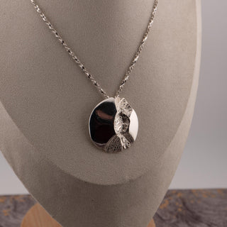 Reserved Grace vintage sterling silver Brutalist pendant necklace with polished and molten textured silver disk.