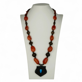 Reserved Grace antique necklace with orange carnelian beads, metal spacers, and an ornate pendant with blue enamel.