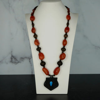 Reserved Grace vintage 27-inch necklace with hand-polished carnelian beads and an ornate tribal pendant with blue enamel.