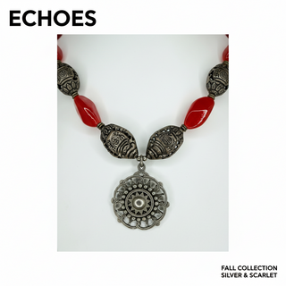 Reserved Grace artisan necklace featuring a red carnelian medallion pendant with ornate sterling silver beads.