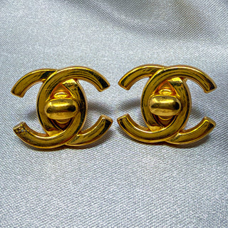 Reserved Grace vintage gold-plated Chanel CC turn lock clip-on earrings with iconic logo design