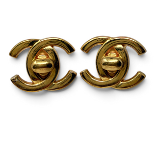 Reserved Grace vintage Chanel gold-plated CC turn lock clip-on earrings with iconic logo design.