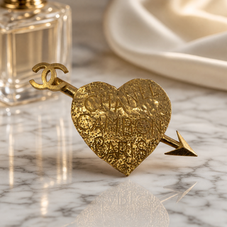 Reserved Grace vintage Chanel 1993 gold-plated heart and arrow brooch with Rue Cambon Paris graffiti lettering