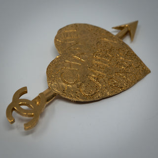 Reserved Grace vintage gold-plated Chanel heart and arrow brooch with Rue Cambon Paris graffiti and CC logo