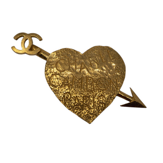 Reserved Grace vintage Chanel 1993 gold-plated heart and arrow brooch with Rue Cambon Paris graffiti and CC logo