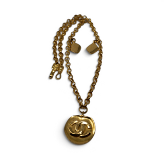 Reserved Grace vintage Chanel gold-plated belcher chain necklace with a round CC logo medallion pendant from 1996.