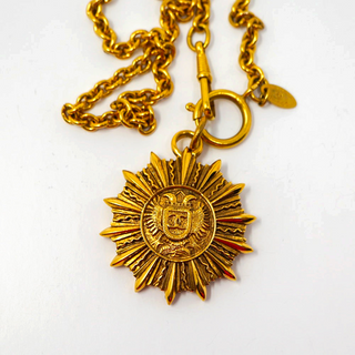 Reserved Grace vintage Chanel gold-plated sunburst medallion pendant necklace on a long chain