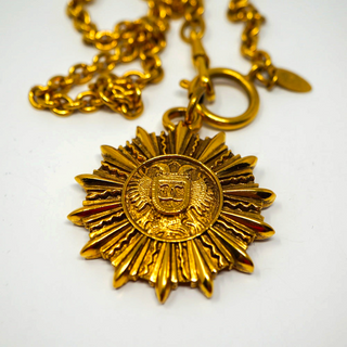 Reserved Grace vintage Chanel gold-plated sunburst medallion pendant necklace on a long chain