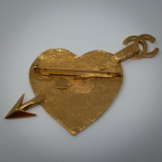 Reserved Grace vintage Chanel 1993 gold-plated heart and arrow brooch, back view showing the pin and hallmark.