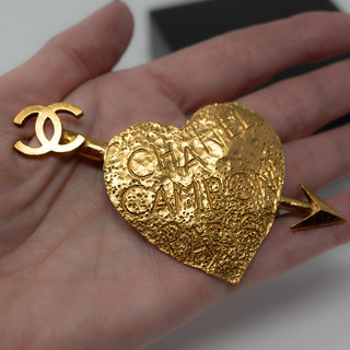 Reserved Grace vintage Chanel 1993 gold-plated heart and arrow brooch with Rue Cambon Paris graffiti and CC logo