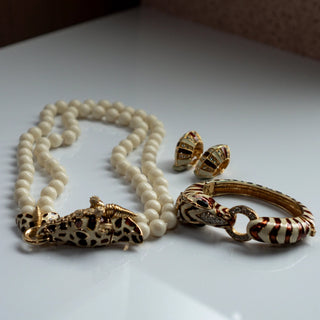 Reserved Grace vintage Ciner giraffe necklace, zebra bracelet, and enamel earring parure set with crystal accents.