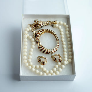 Reserved Grace vintage Ciner wildlife parure featuring a giraffe necklace, zebra bracelet, and earrings in a gift box.