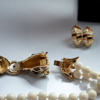Reserved Grace vintage Ciner giraffe necklace clasp and zebra earrings with gold-tone metal, enamel, and crystal details.