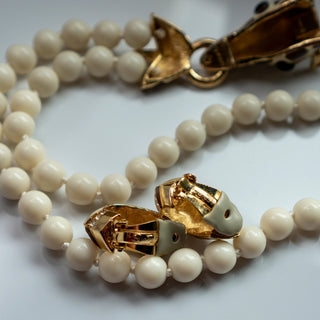 Reserved Grace vintage Ciner wildlife parure featuring cream beaded necklace and matching gold-tone enamel earrings
