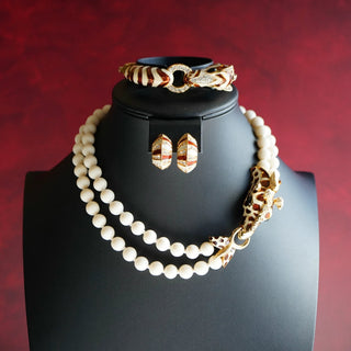 Reserved Grace vintage Ciner wildlife parure featuring a giraffe necklace, zebra bracelet, and earrings with crystals.
