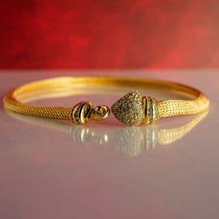 Reserved Grace vintage Christian Dior gold mesh collar necklace with a crystal-encrusted clasp on a reflective surface.