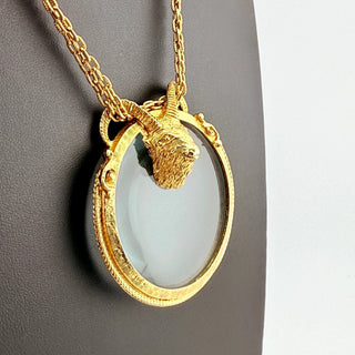 Reserved Grace vintage Florenza goldtone ram head magnifying glass pendant necklace on a 19-inch chain.