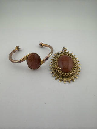Reserved Grace vintage-style cuff bracelet and filigree pendant set featuring shimmering brown goldstone cabochons