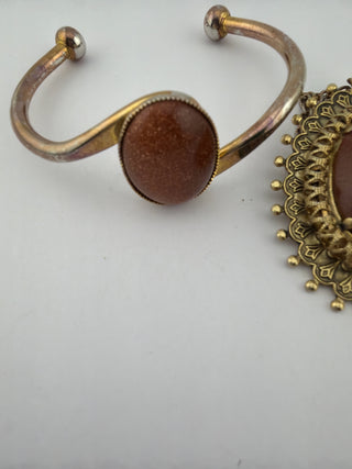 Reserved Grace vintage-style cuff bracelet and filigree pendant set featuring shimmering brown goldstone cabochons.