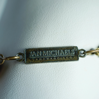Reserved Grace Jan Michaels antiqued brass logo tag on a vintage statement necklace