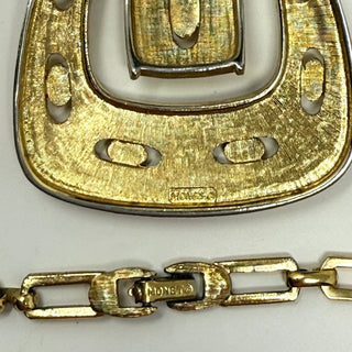 Reserved Grace vintage 1970s Monet gold-tone metal necklace featuring a textured belt buckle pendant and link chain