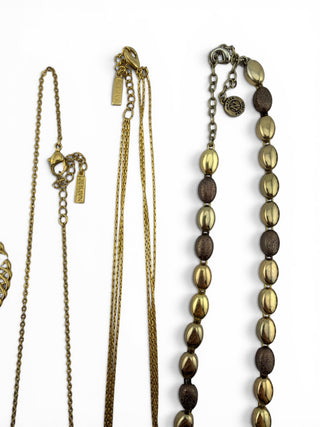 Reserved Grace vintage Napier gold-tone necklace collection featuring delicate chains and textured bead designs.