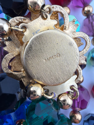 Reserved Grace vintage Napier multi-strand necklace featuring an ornate gold-tone floral clasp with maker mark