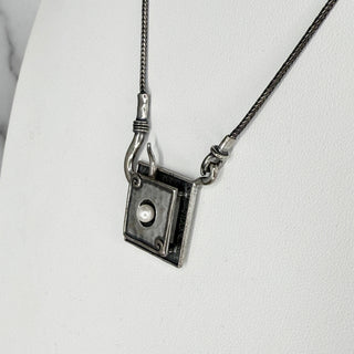 Reserved Grace retired Silpada sterling silver necklace featuring a diamond-shaped pendant with a central pearl accent.