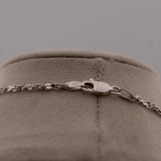 Reserved Grace sterling silver chain necklace featuring a 925 hallmark lobster clasp on a grey velvet display stand